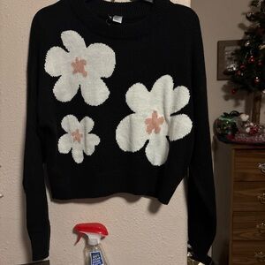 Divided Black Sweater with White Floral Design